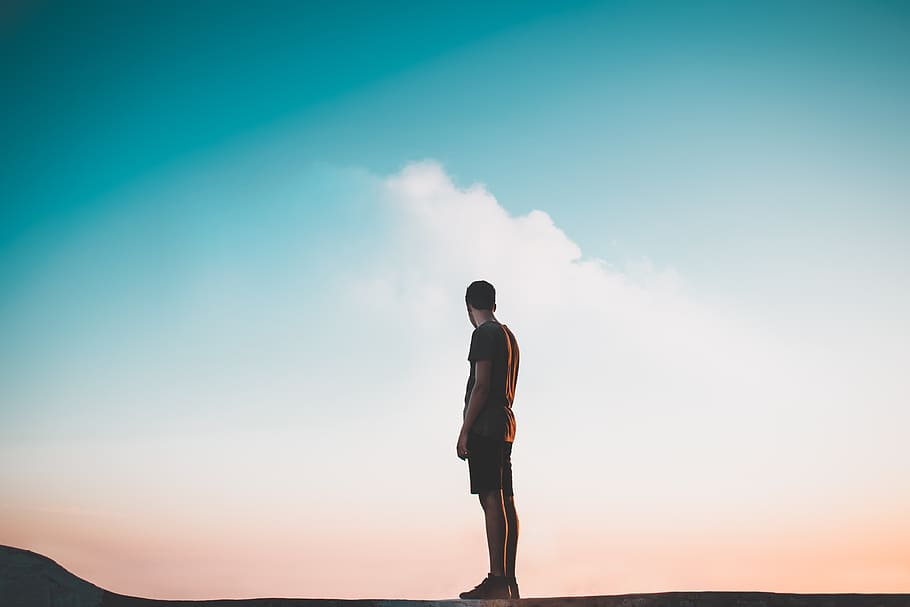 man standing on flat surface during daytime, person, cloud, edge HD wallpaper