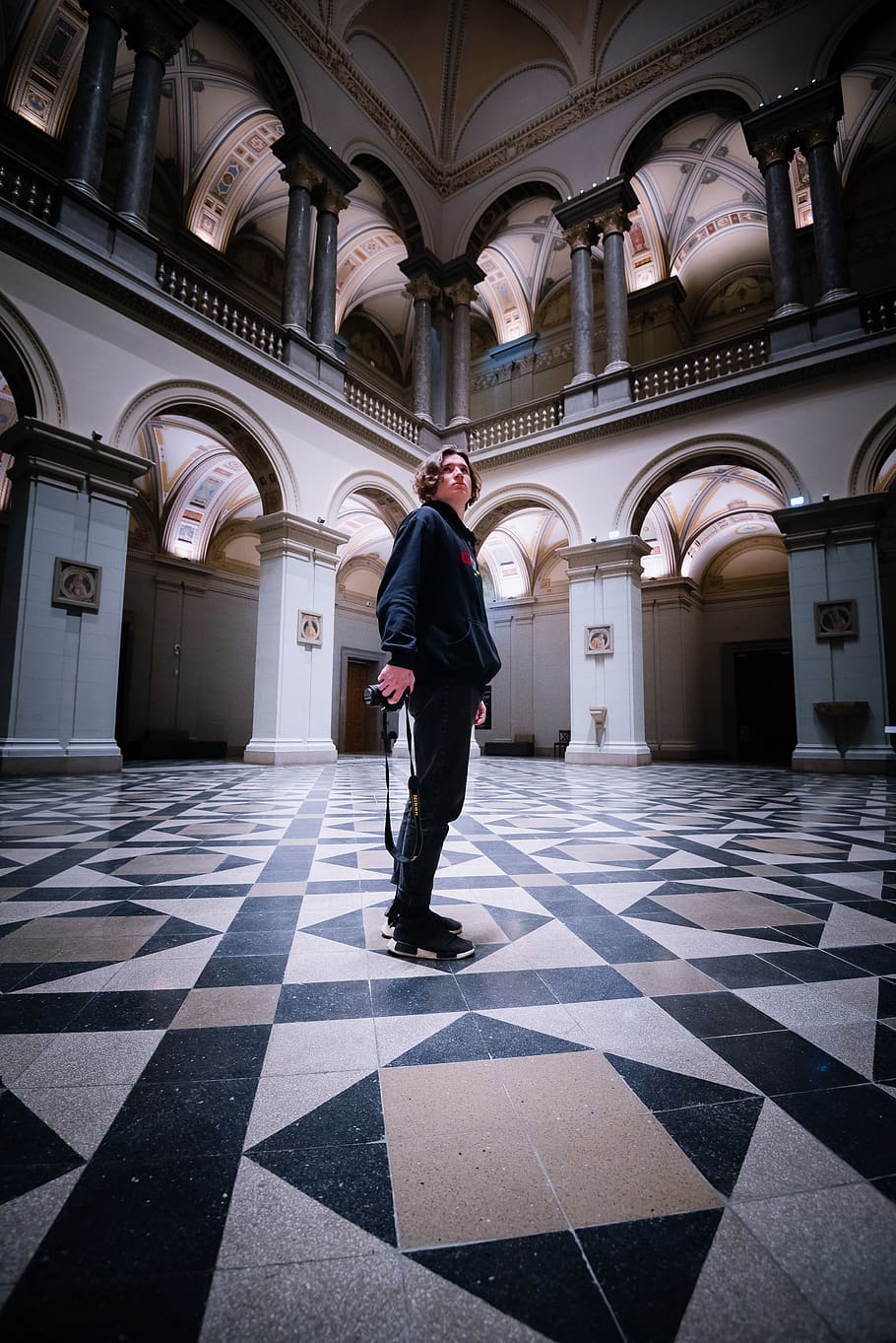 man standing inside hall, full length, real people, one person HD wallpaper