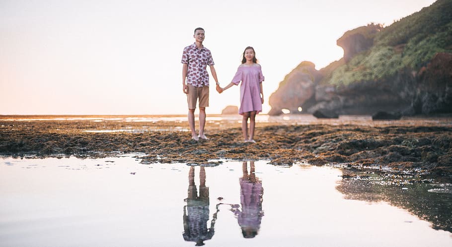 Portrait Photography of Man and Woman Holding Hands, beach, clouds HD wallpaper