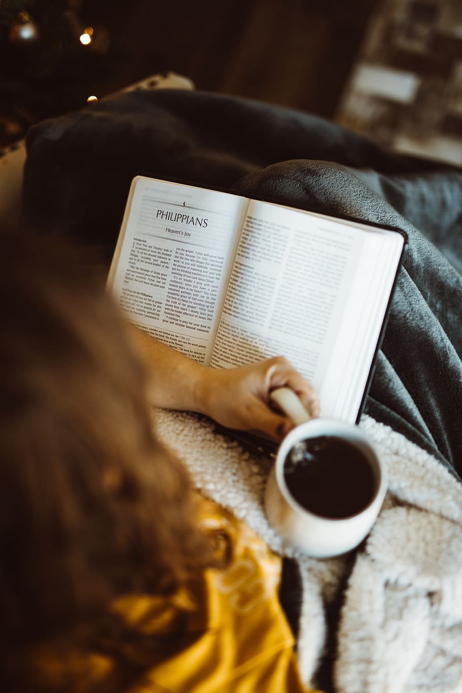 person holding white ceramic mug while reading book, coffee cup HD wallpaper