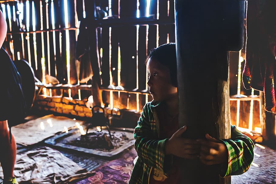 boy embracing the post inside house, person, human, apparel, clothing HD wallpaper
