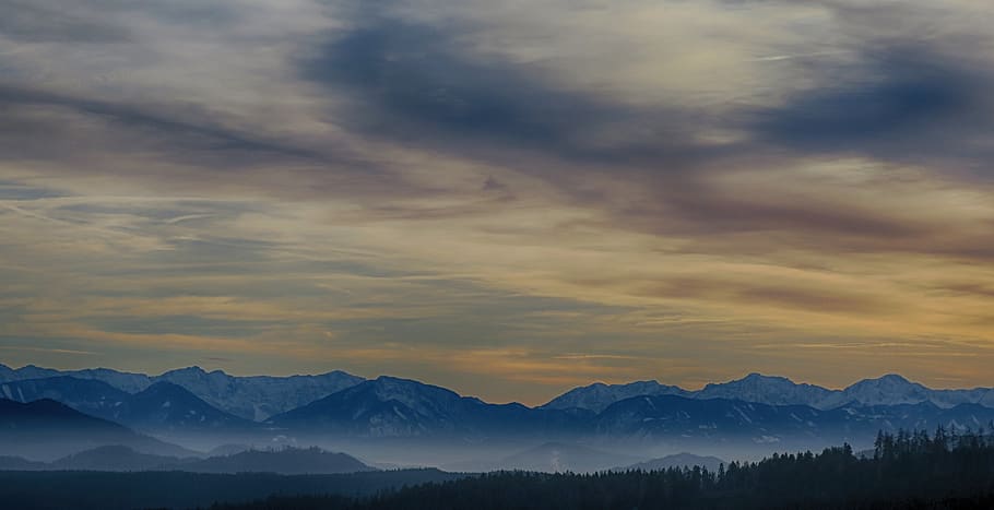 Tall Mountains Surrounded by Fogs Below the Clouds High-saturated Photography HD wallpaper