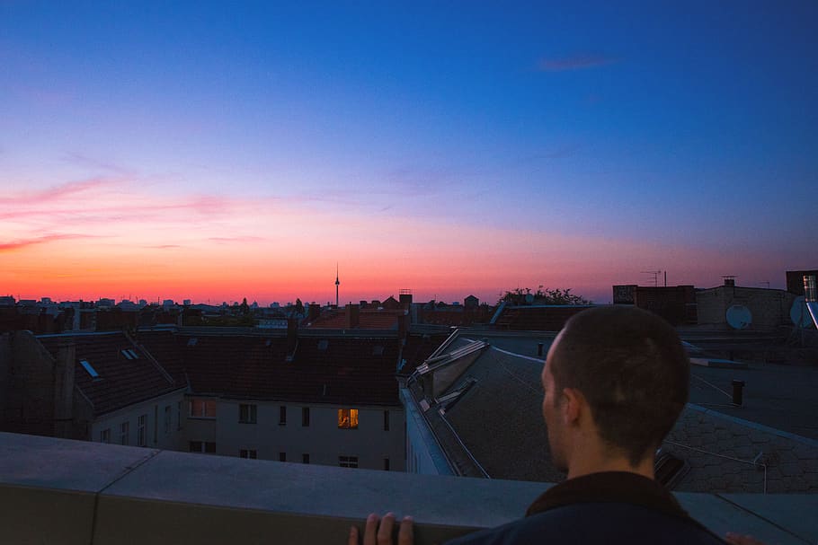 rooftop, evening, night, tv tower, man, overview, sunset, light HD wallpaper