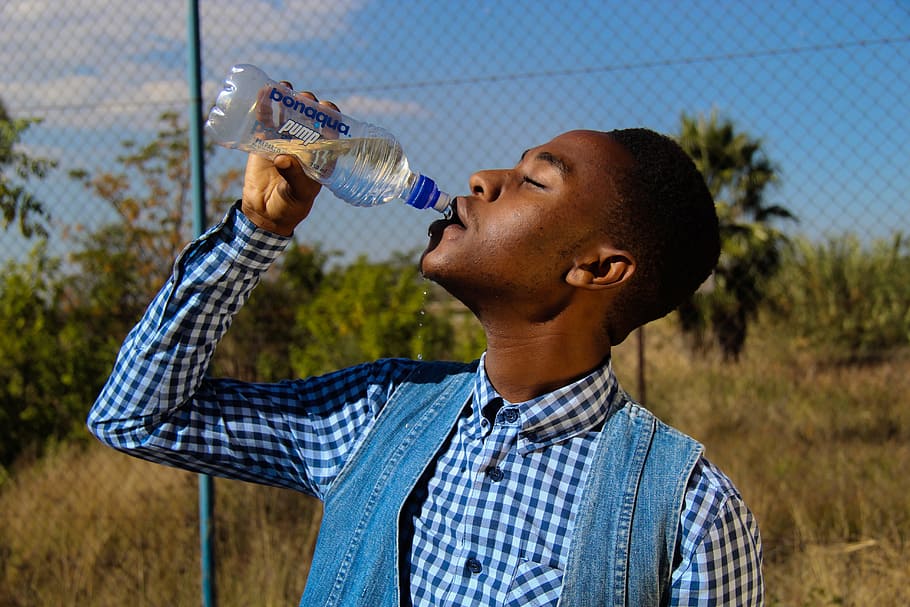 Photography of A Man Drinking Water, blur, bottle, boy, close-up