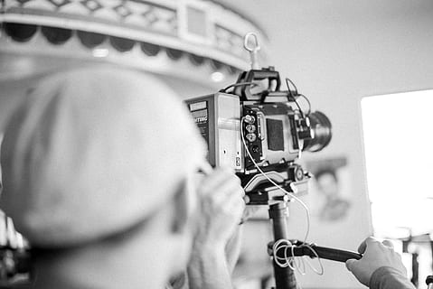 grayscale photo of man using a video camera, person, cap, tech HD wallpaper