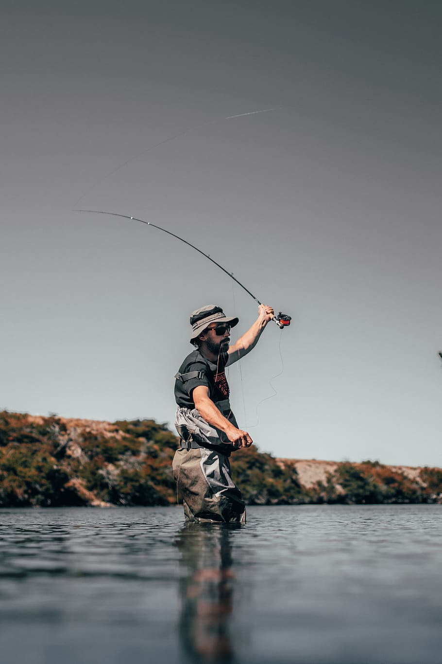 man about to catch fish, water, sky, real people, leisure activity HD wallpaper