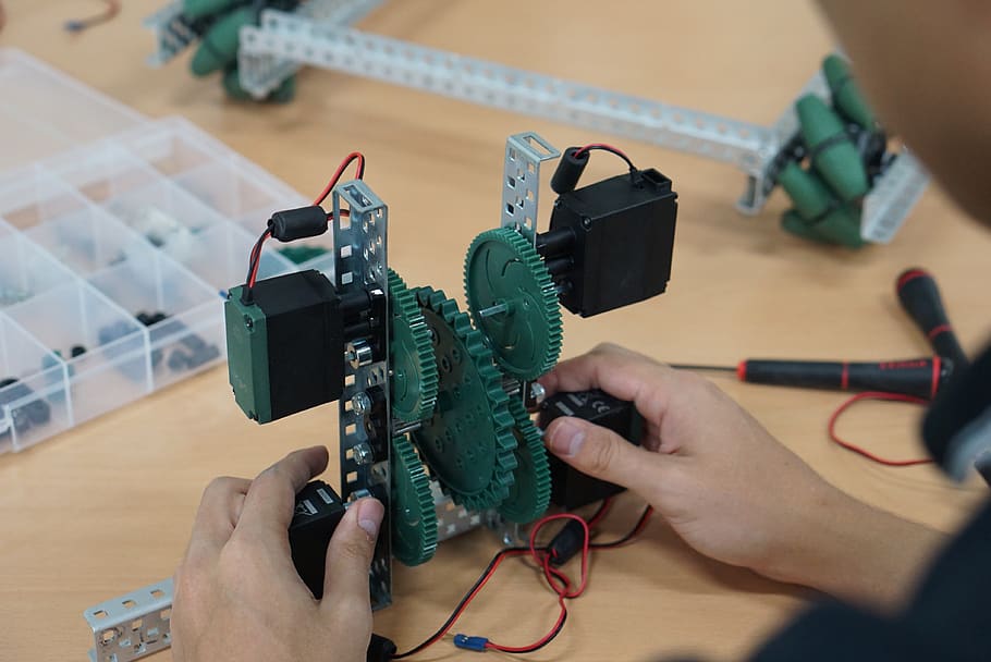 robotics, building, creating, making, creativity, working, holding HD wallpaper