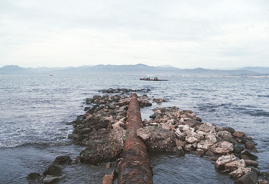 chile, la serena, pipe, rust, ocean, rocks, water, sea, solid HD wallpaper