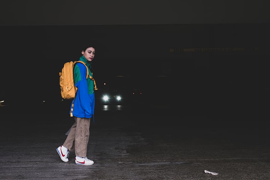 Woman Wearing Yellow Backpack, action, adult, blue, blur, casual HD wallpaper