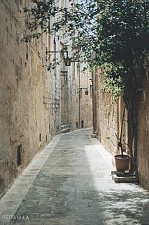 road between walls, city, street, town, urban, building, path HD wallpaper