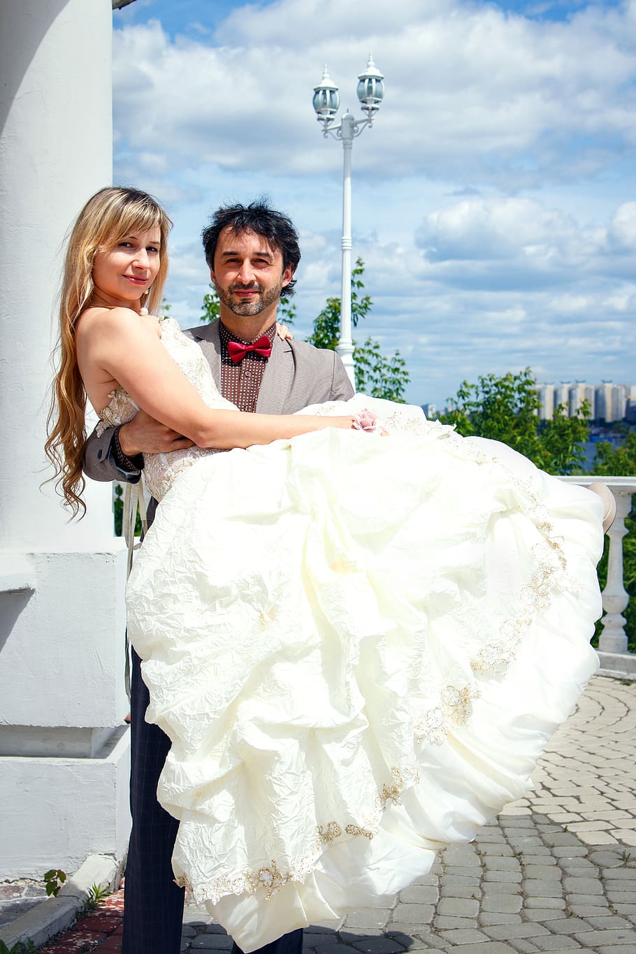 Man Carrying Woman in White Wedding Dress, adult, beautiful, bridal