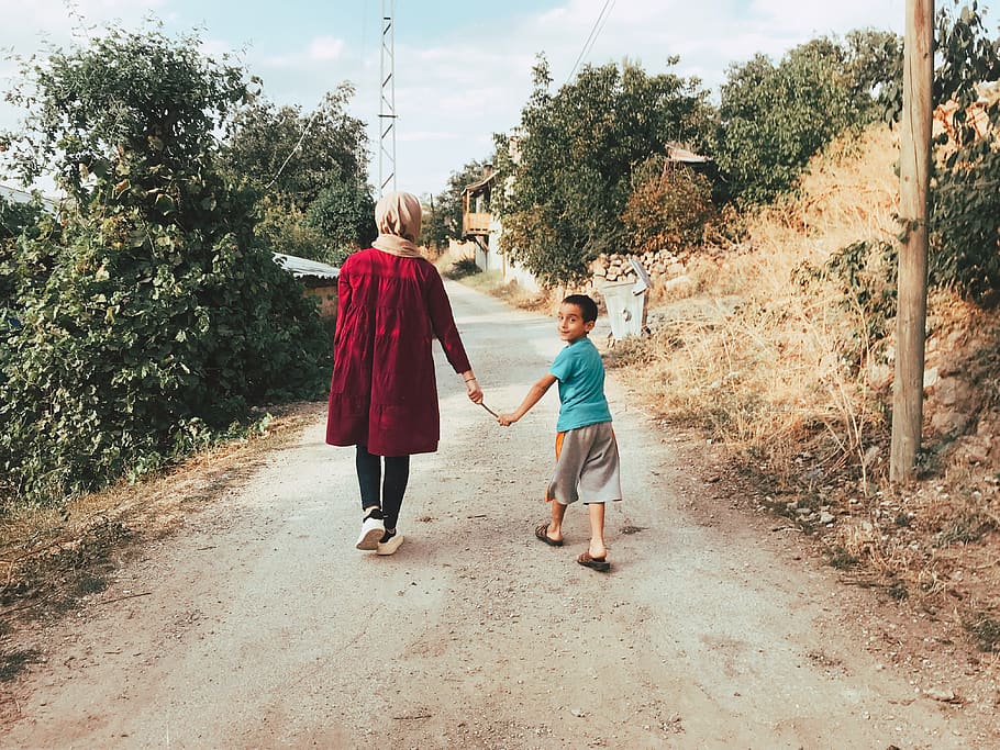 Woman And Boy Holding A Stick While Walking, child, kid, mobilechallenge HD wallpaper