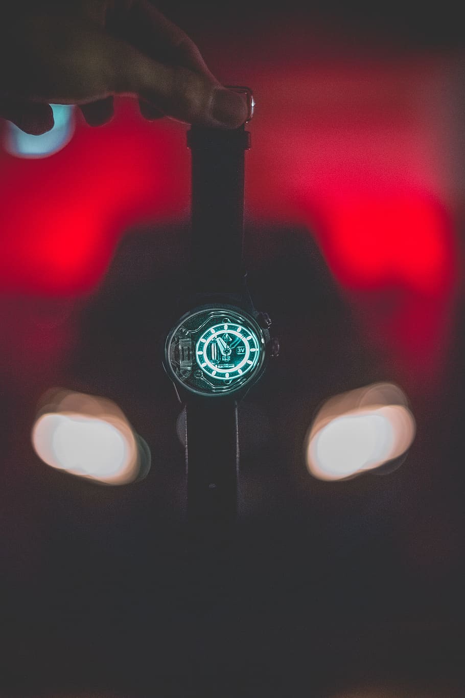 Person Holding Round Black Digital Watch With Black Band, blurred background HD wallpaper