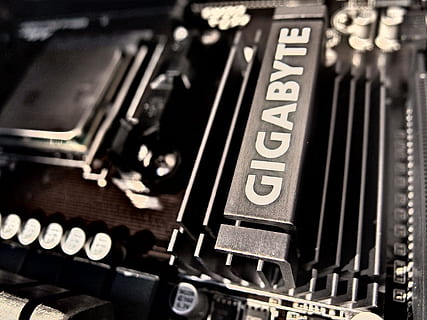 Gigabyte Black Motherboard, capacitors, cpu, device, electronics HD wallpaper