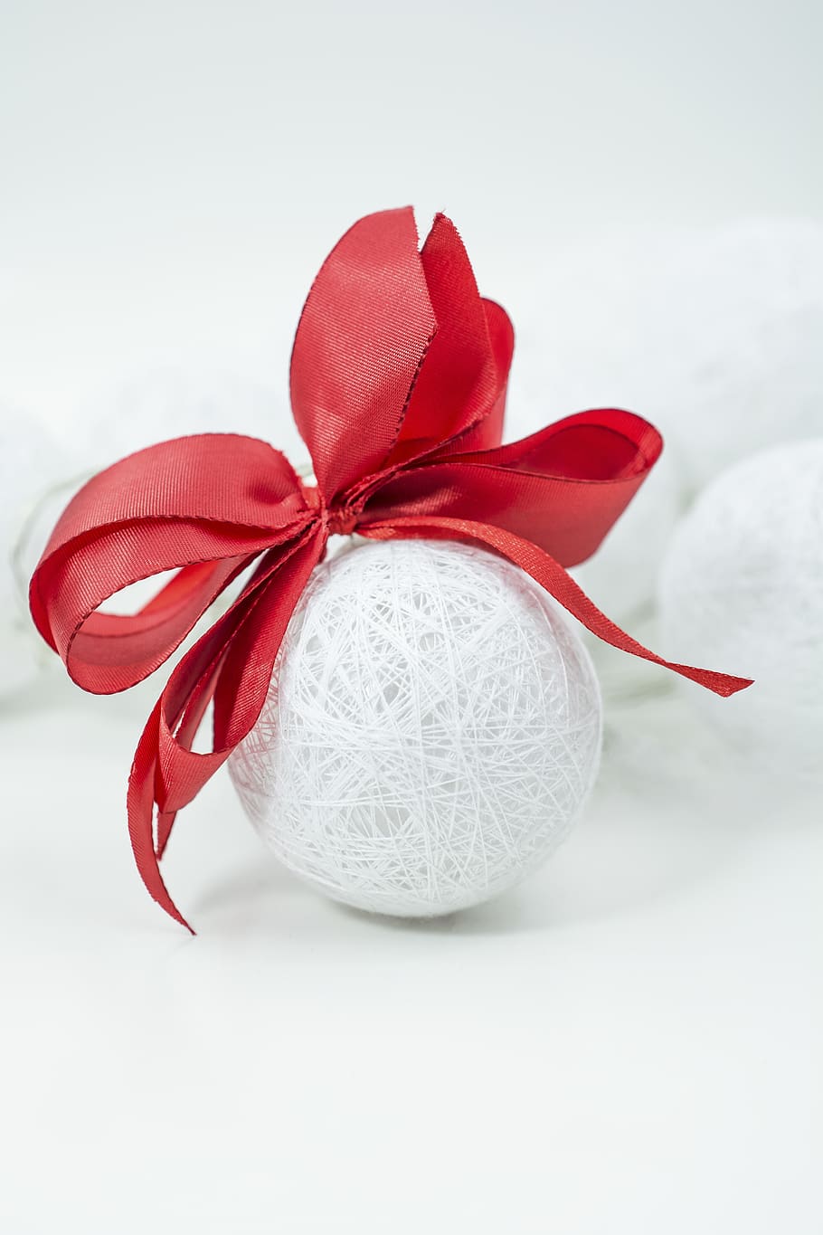 white and red ball decor, white background, studio shot, close-up HD wallpaper