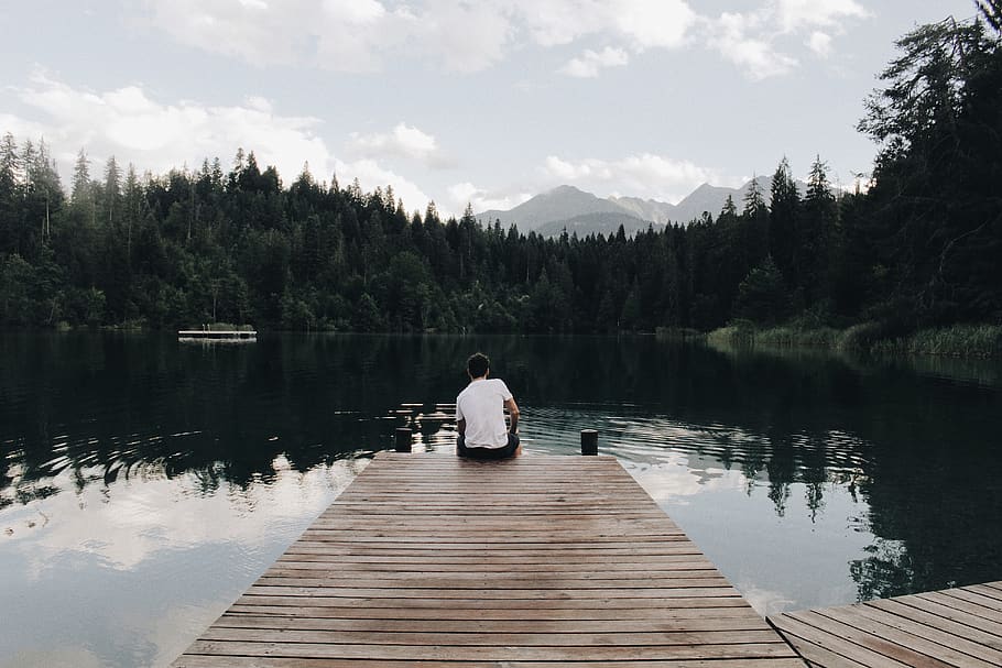 Man Sitting on Dock, background, boardwalk, bridge, clouds, crestasee HD wallpaper