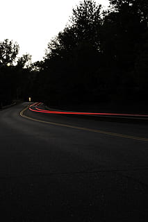 concrete road with cars passing, light, tree, forest, woodland HD wallpaper