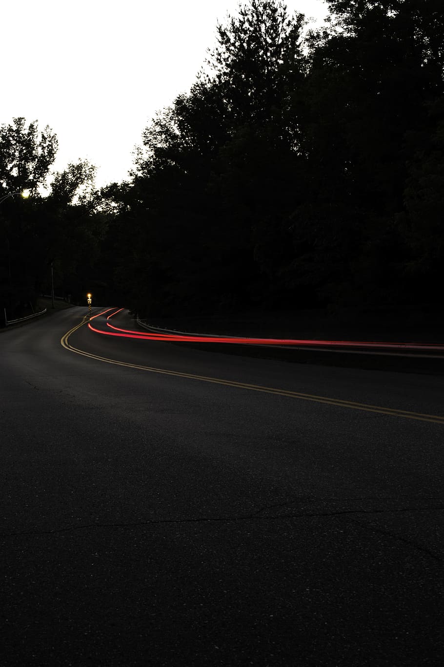 concrete road with cars passing, light, tree, forest, woodland HD wallpaper