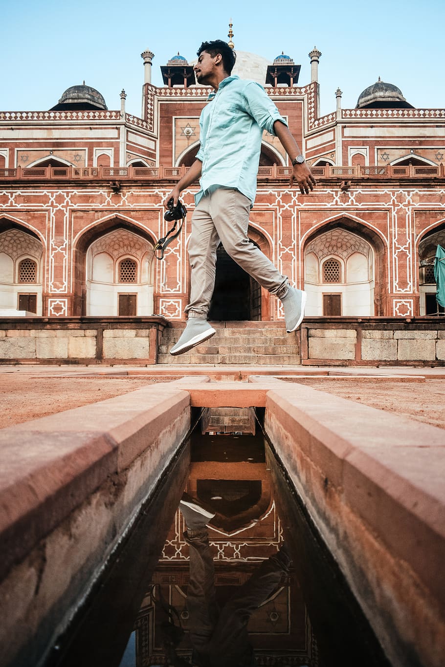 Man Jumping, ancient, architecture, building, person, real people HD wallpaper