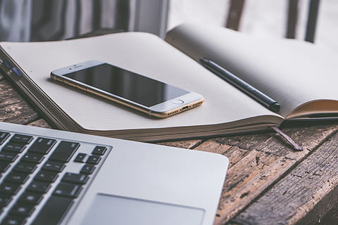 Gold Iphone 7 on Top of Book Beside Macbook, background, blank HD wallpaper