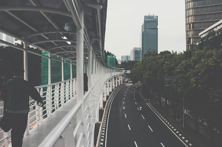 man walking on bridge, architecture, built structure, building exterior HD wallpaper