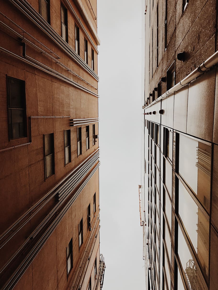 low-angle gray building, brick, construction, scaffolding, apartment building HD wallpaper