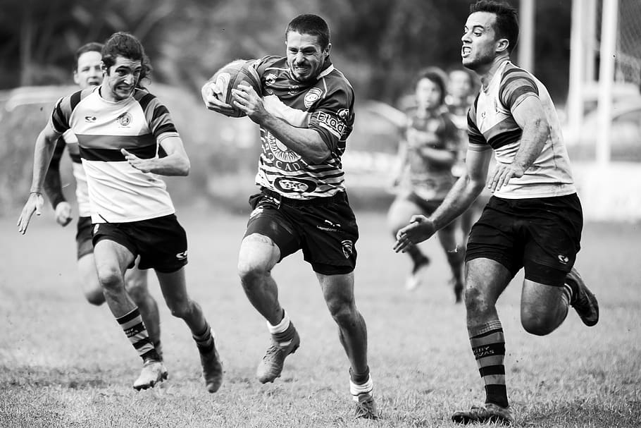 grayscale photography of men playing rugby, human, person, people