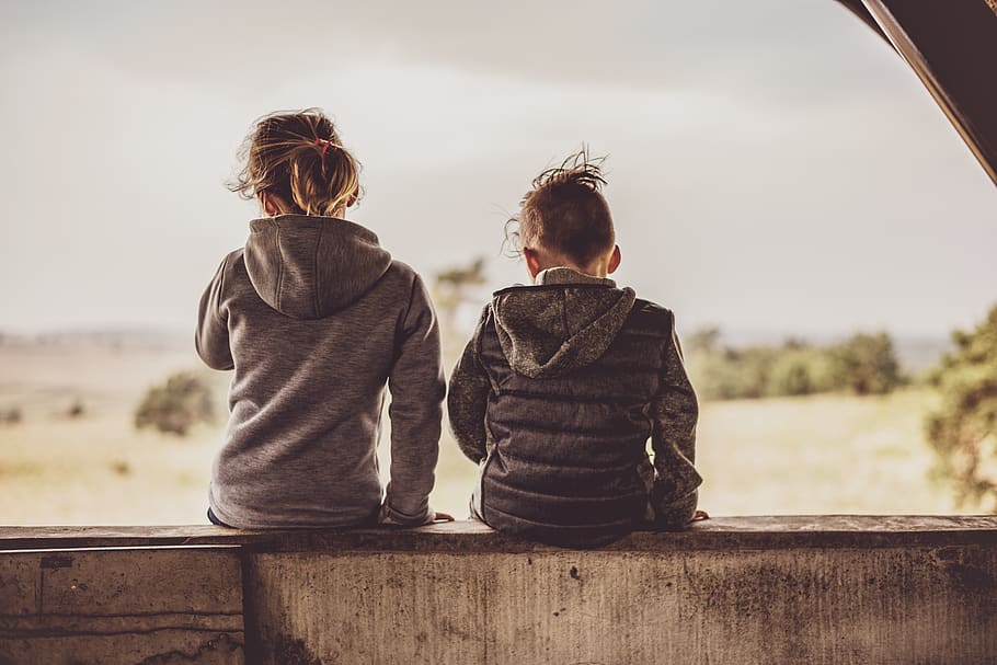 two toddlers setting on table, two people, child, rear view, togetherness HD wallpaper