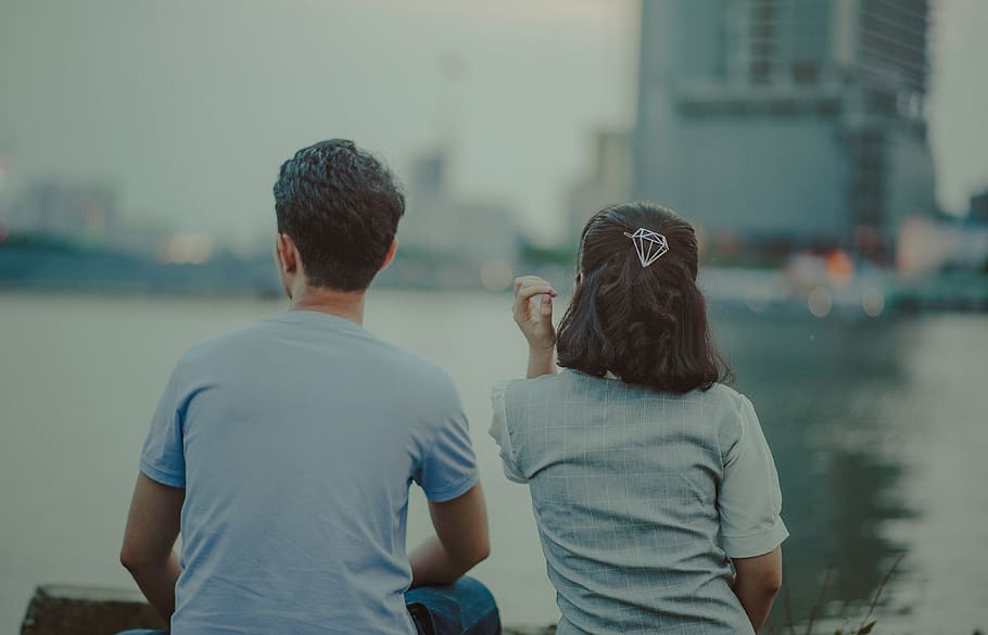 Man and Woman Wearing Shirt Facing Body of Water, back view, blur HD wallpaper