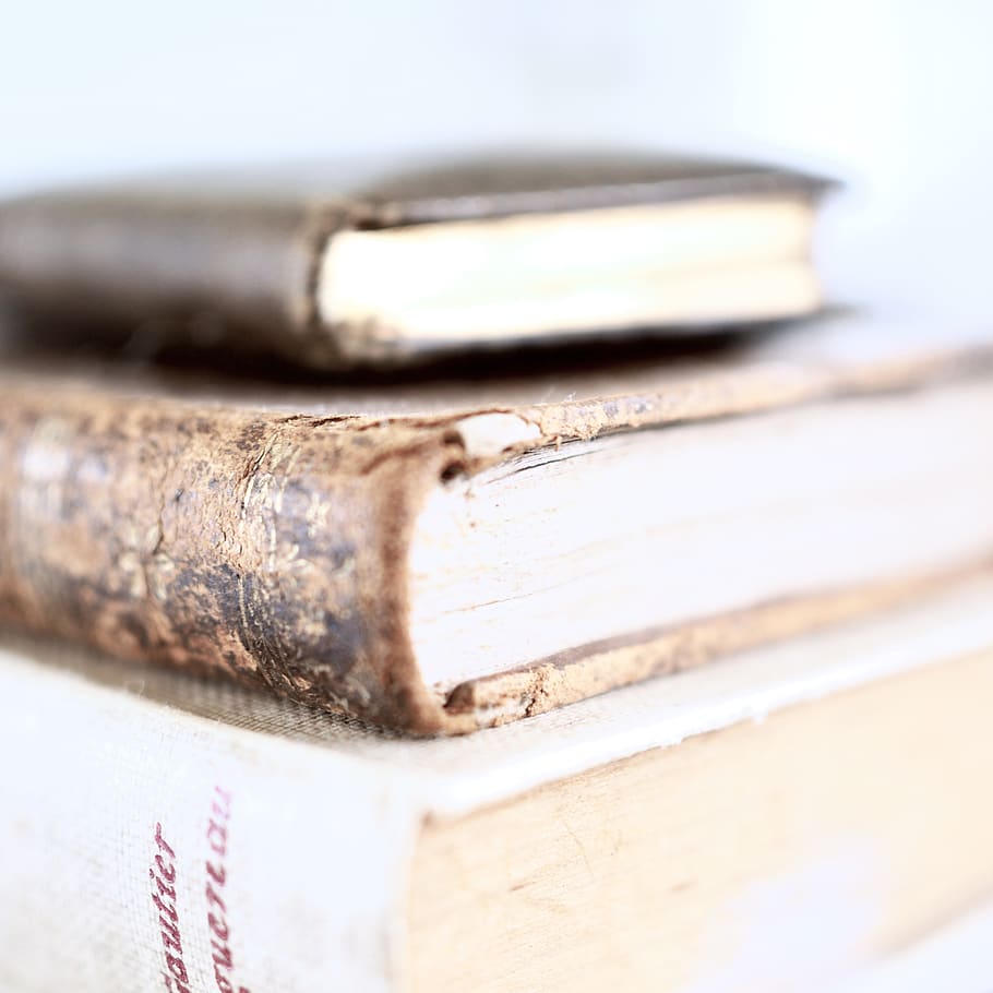 stacked hardbound books, wood - material, close-up, studio shot HD wallpaper