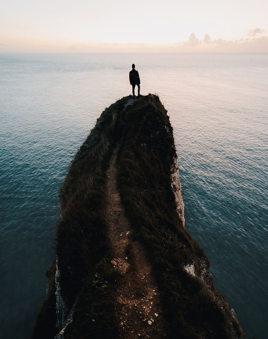 man standing peak, human, person, cliff, outdoors, nature, promontory HD wallpaper