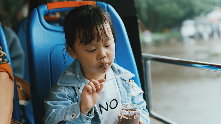 Close-Up Photo of Child Eating Ice Cream, adorable, baby, blur