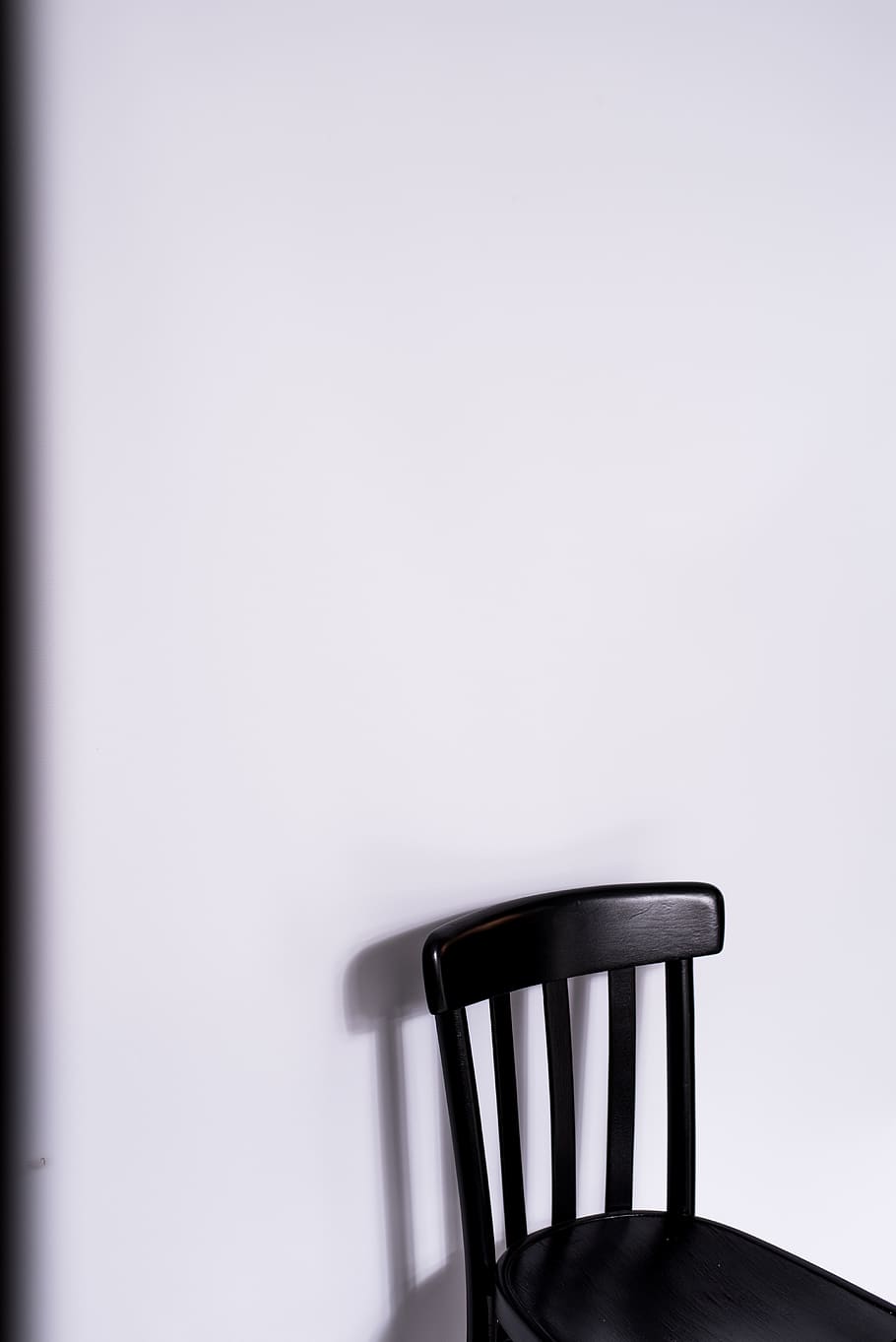 empty black chair, seat, copy space, indoors, no people, absence HD wallpaper