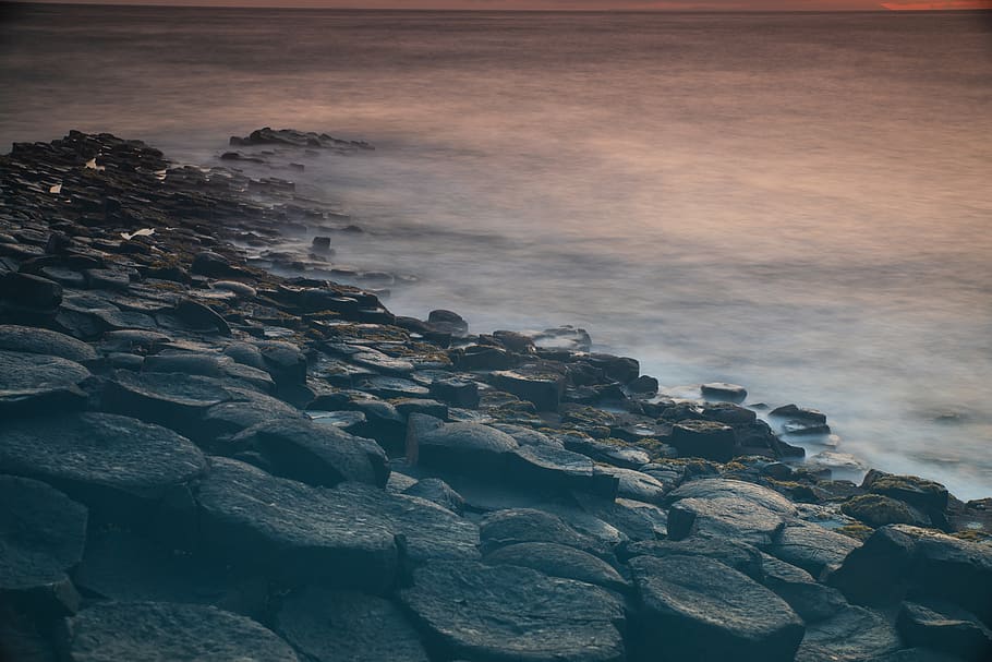 rocks beside beach, sea, giant's causeway, united kingdom, bushmills HD wallpaper