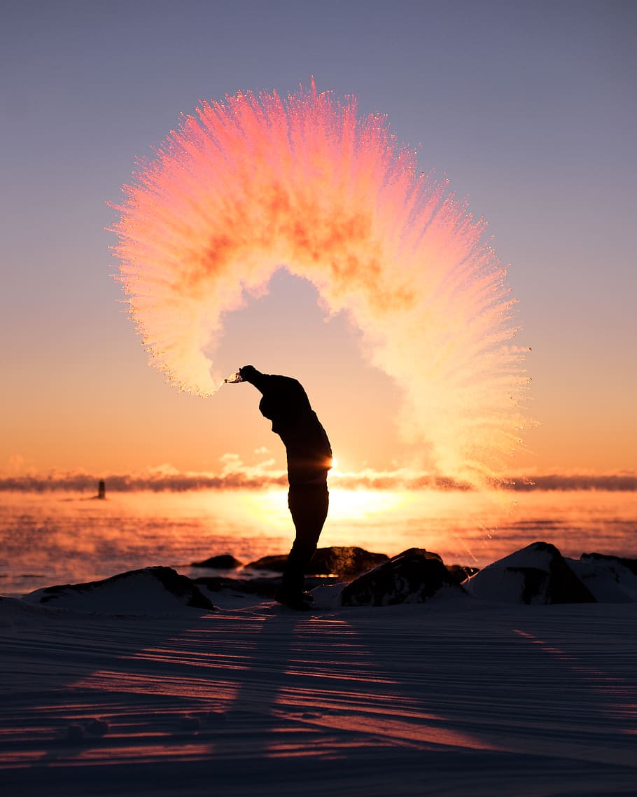 person throwing dust, silhouette, sky, sunset, one person, water HD wallpaper
