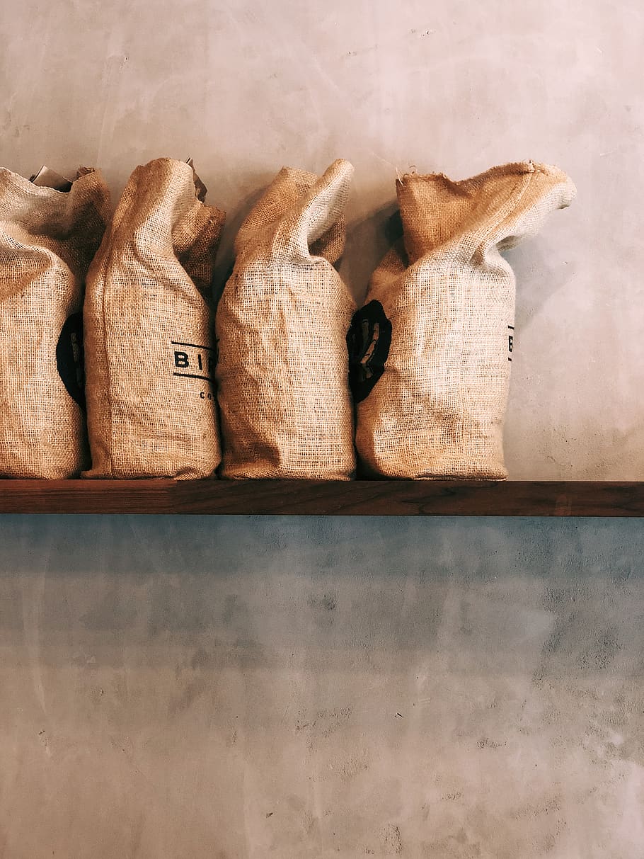 four brown sacks, bag, birch coffee, coffee bean, shelf, modern HD wallpaper