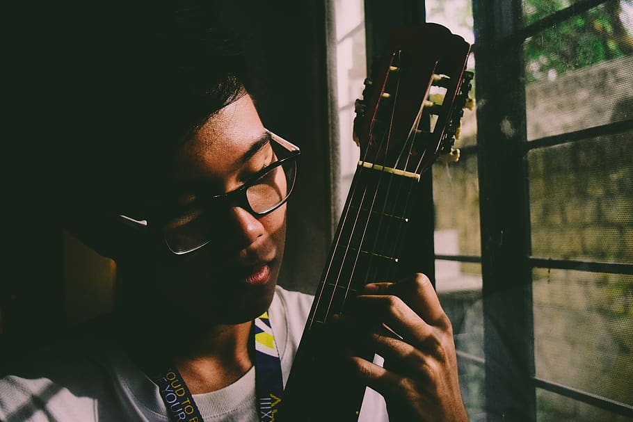 Man Playing String Instrument Near Window Panel, boy, close-up HD wallpaper