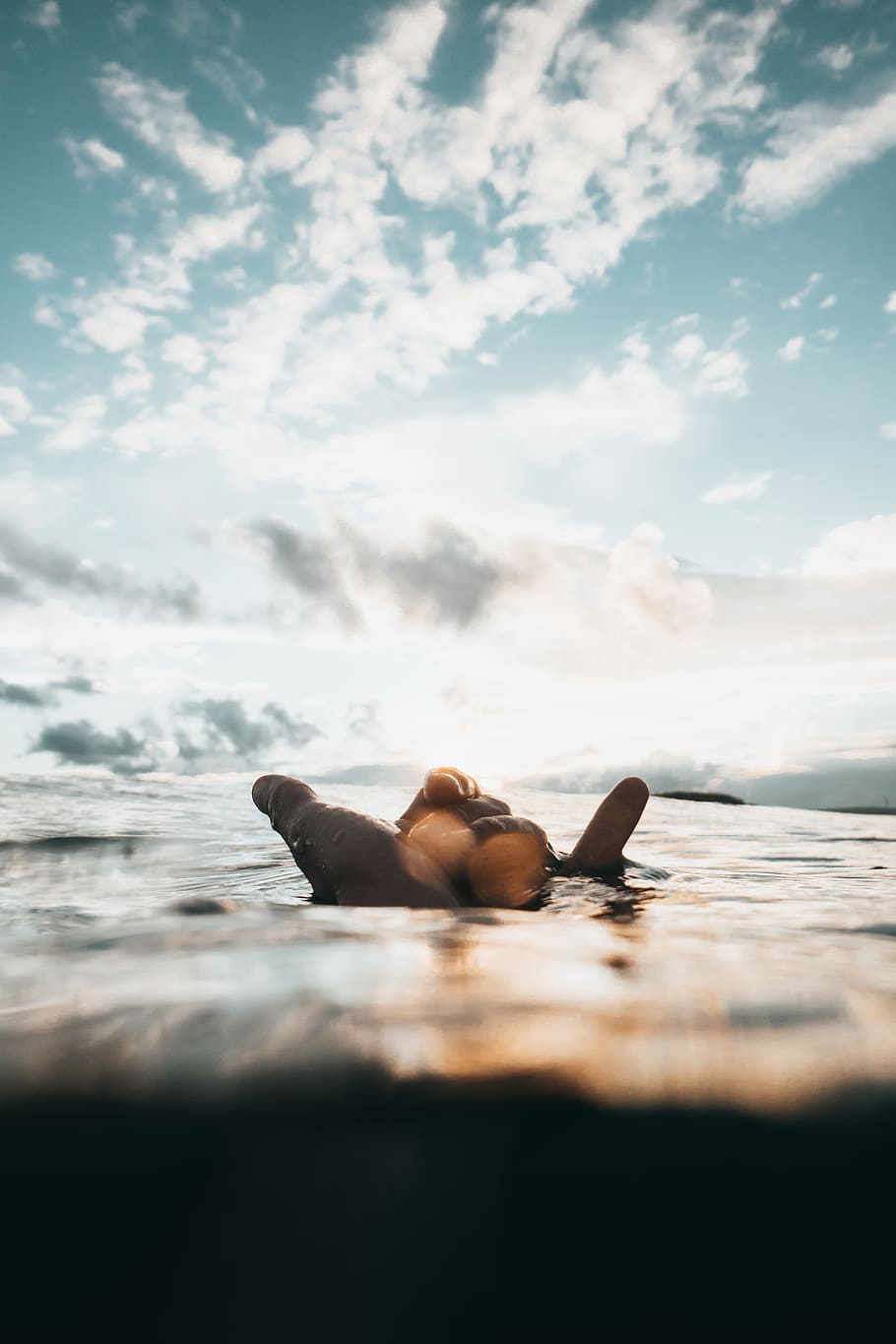 Person Floating on Water at Daytime, background, clouds, colors HD wallpaper