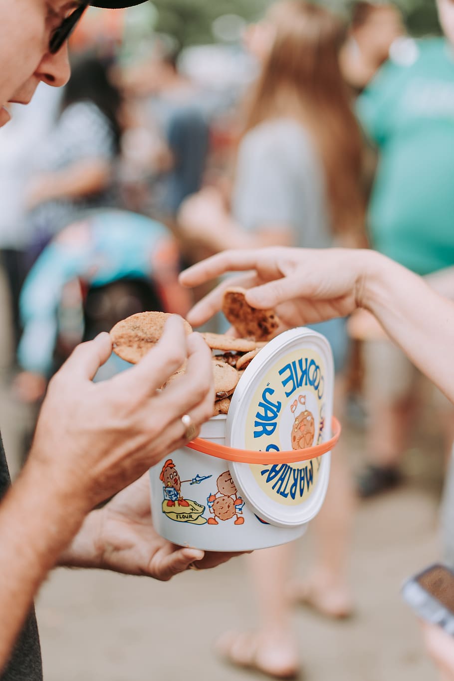 person holding cookie jar, simple, bucket, hand, eating, clean HD wallpaper