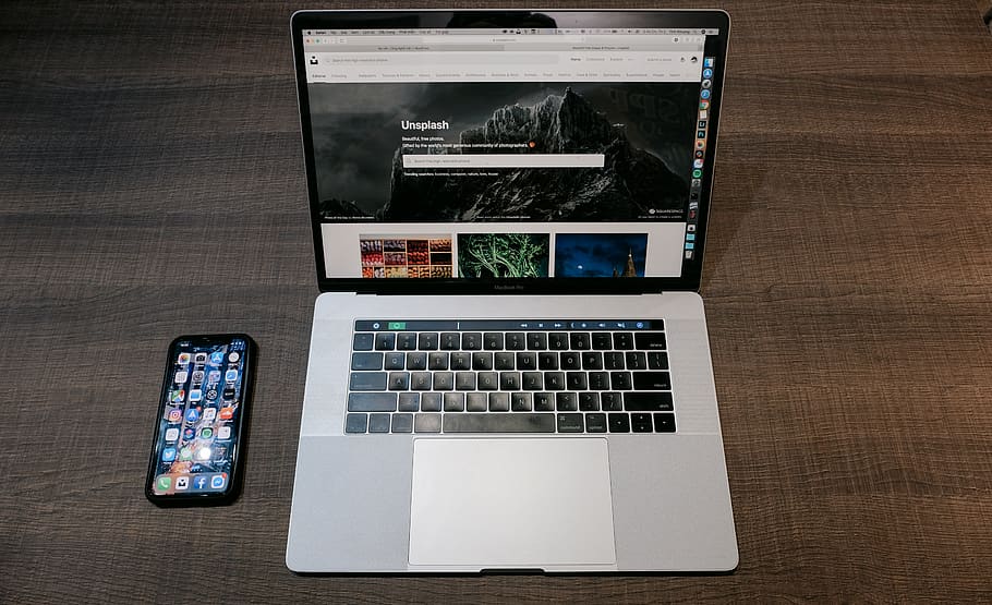 turned on MacBook Pro, communication, wireless technology, table HD wallpaper