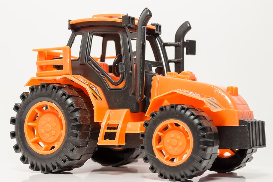 tractor, toy, plastic, construction, transportation, machinery HD wallpaper