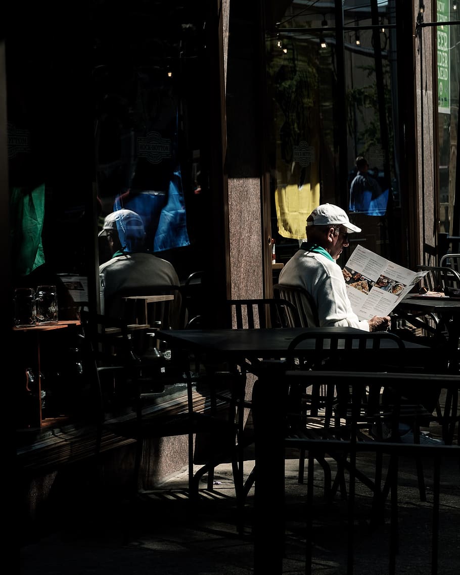 man reading newspaper, male, table, window, reflection, sat, eat HD wallpaper