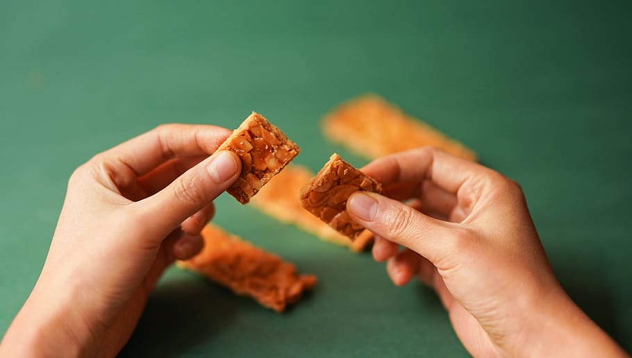 Person Holding Biscuits, food, hands, sweets, human hand, food and drink HD wallpaper