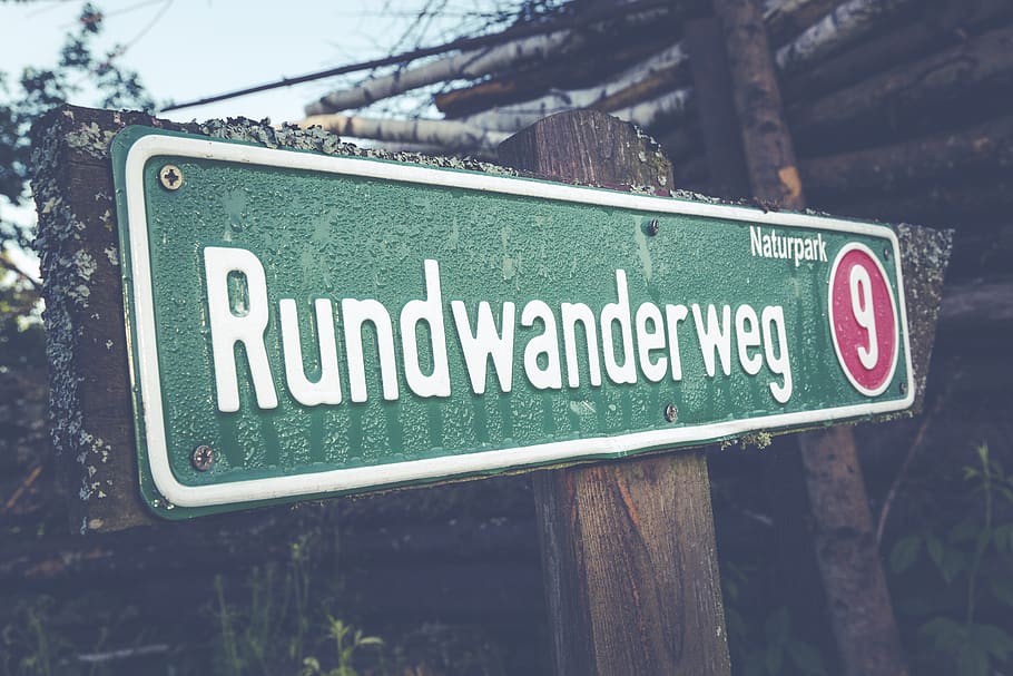 Rundwander Weg 9 Road Signage, close-up, wet, communication, text