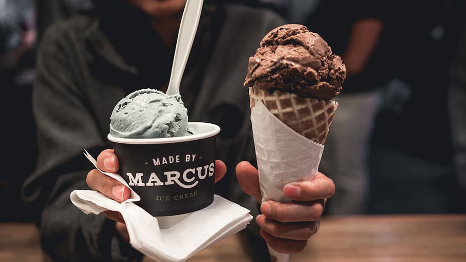 Person Holding Two Ice Creams, blurred background, chocolate HD wallpaper