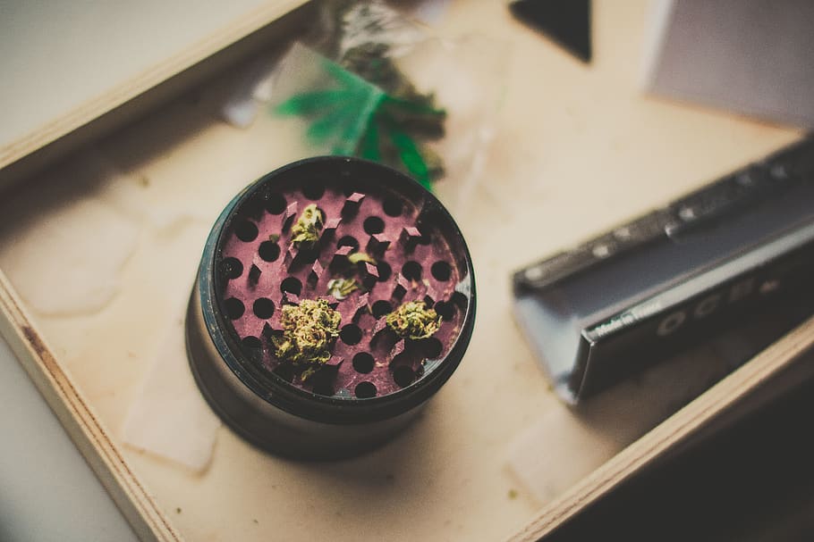 red and black herb grinder, indoors, table, high angle view, still life HD wallpaper