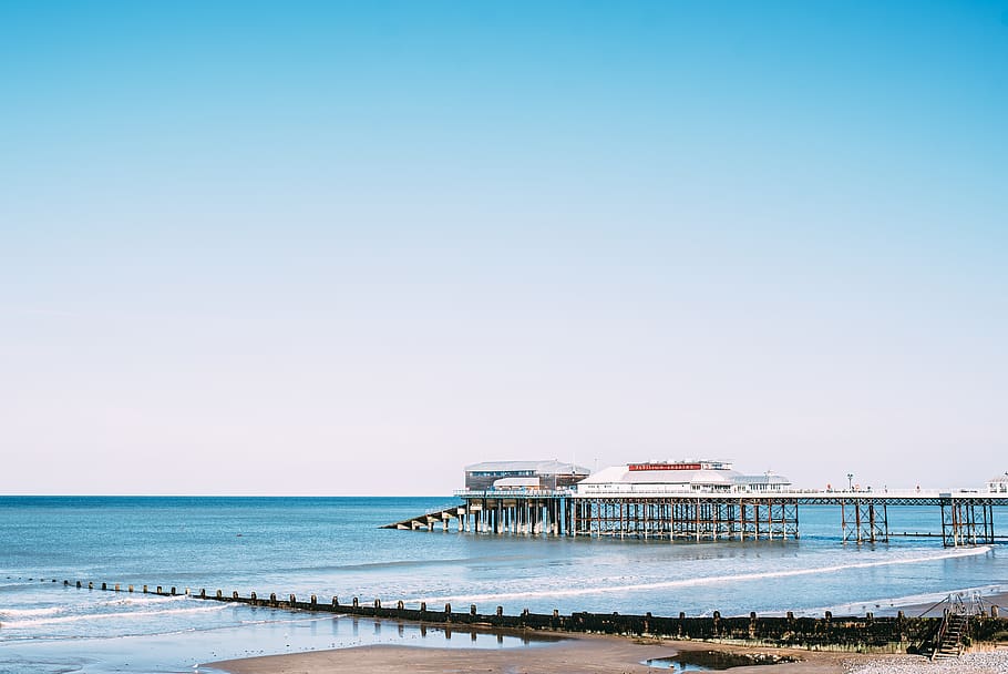 Photo of a Pier, architecture, beach, calm, daylight, horizon HD wallpaper
