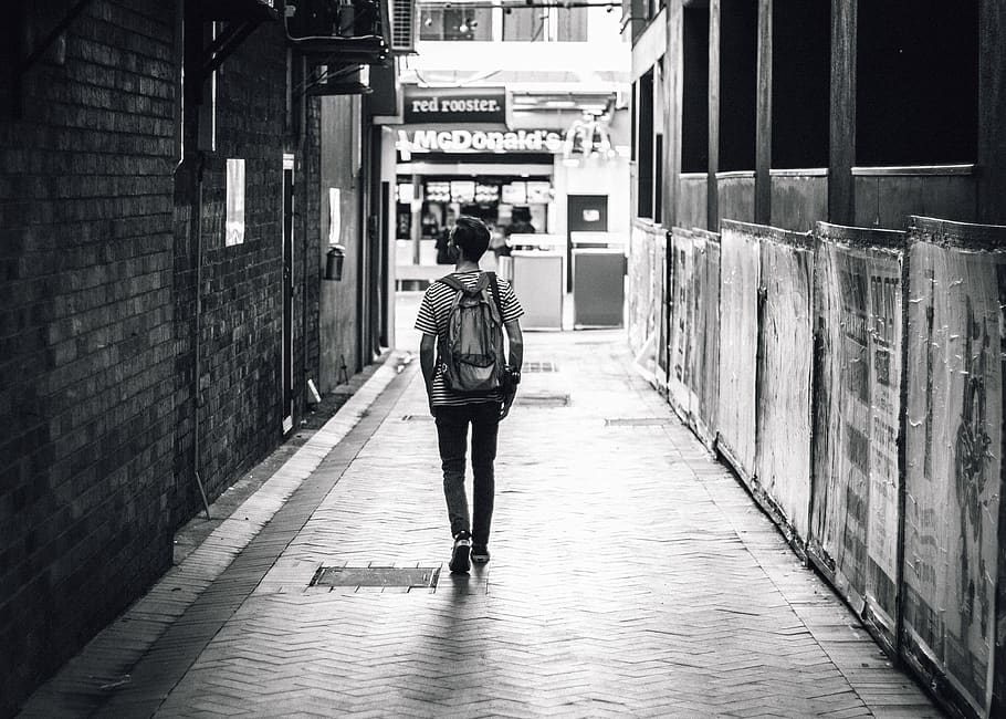 guy, man, walking, backpack, lifestyle, pedestrian, sidewalk HD wallpaper