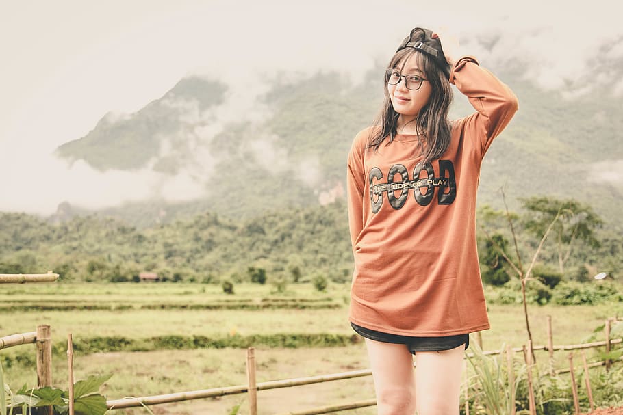 Woman Wearing Orange Long-sleeved Shirt, beautiful, cap, cloudy HD wallpaper