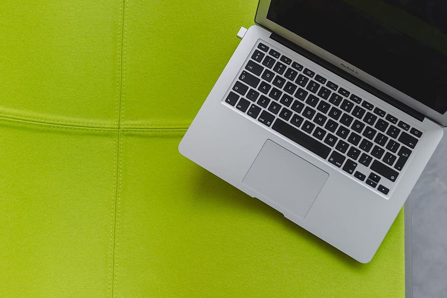 View from above at the laptop on the lime chair, computer, yellow HD wallpaper